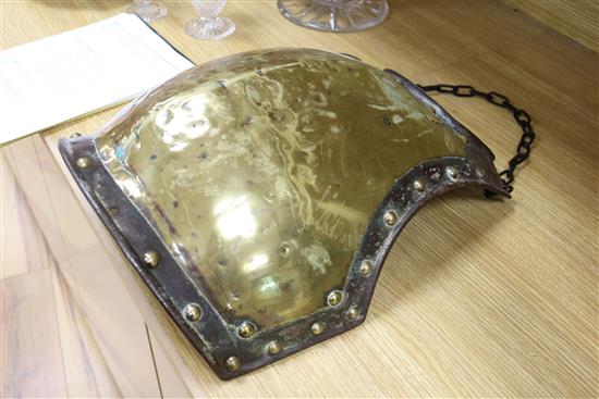 A pair of Victorian brass and iron armour chest plates